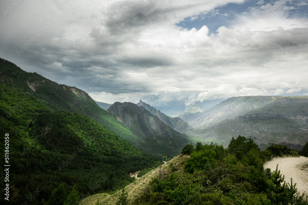 A high-resolution panorama of a beautiful summer view of the mountains. Thunderclouds over the mountains in Dagestan