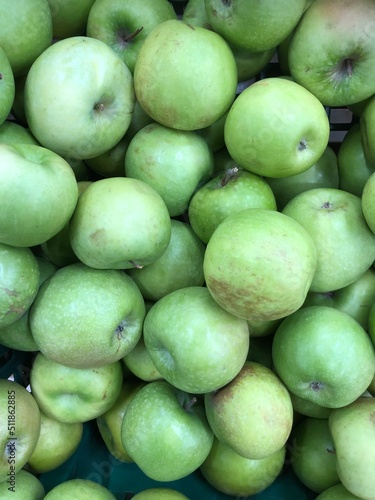 green apples in a market