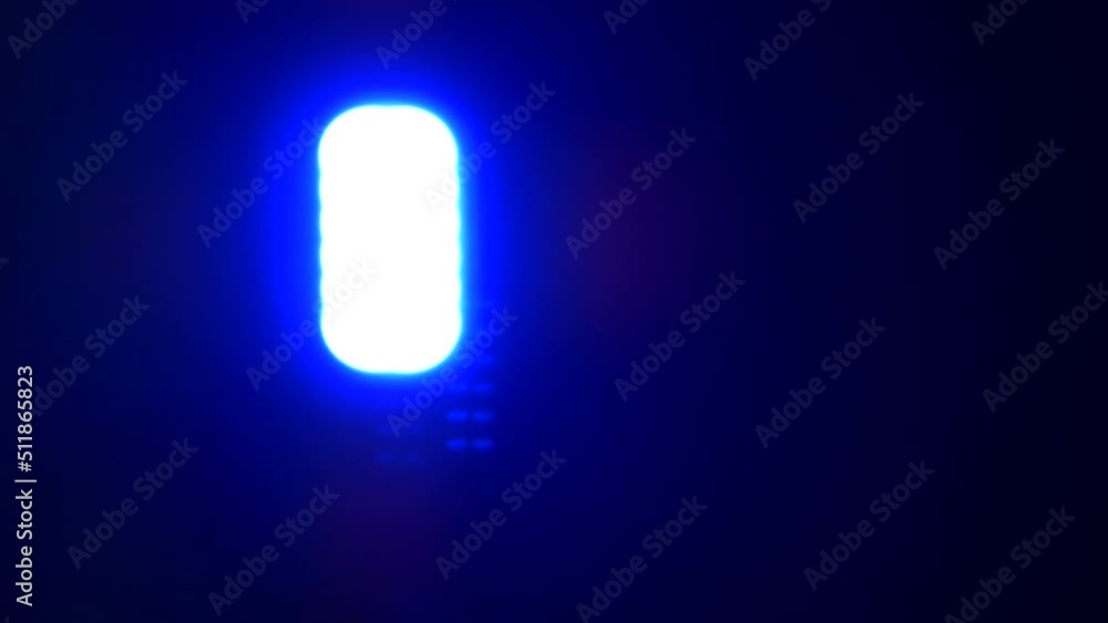 Blue light out of focus. Movement of light blue beam in the dark. Blue light out of focus. Movement of light blue beam in the dark.