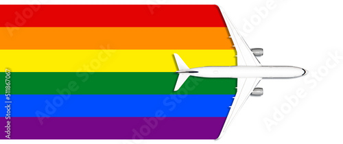 Commercial airplane flying over the LGBT rainbow flag