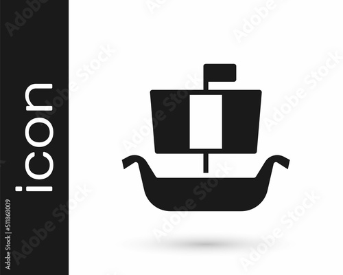 Black Ancient viking scandinavian drakkar icon isolated on white background. Viking transport ship. Vector