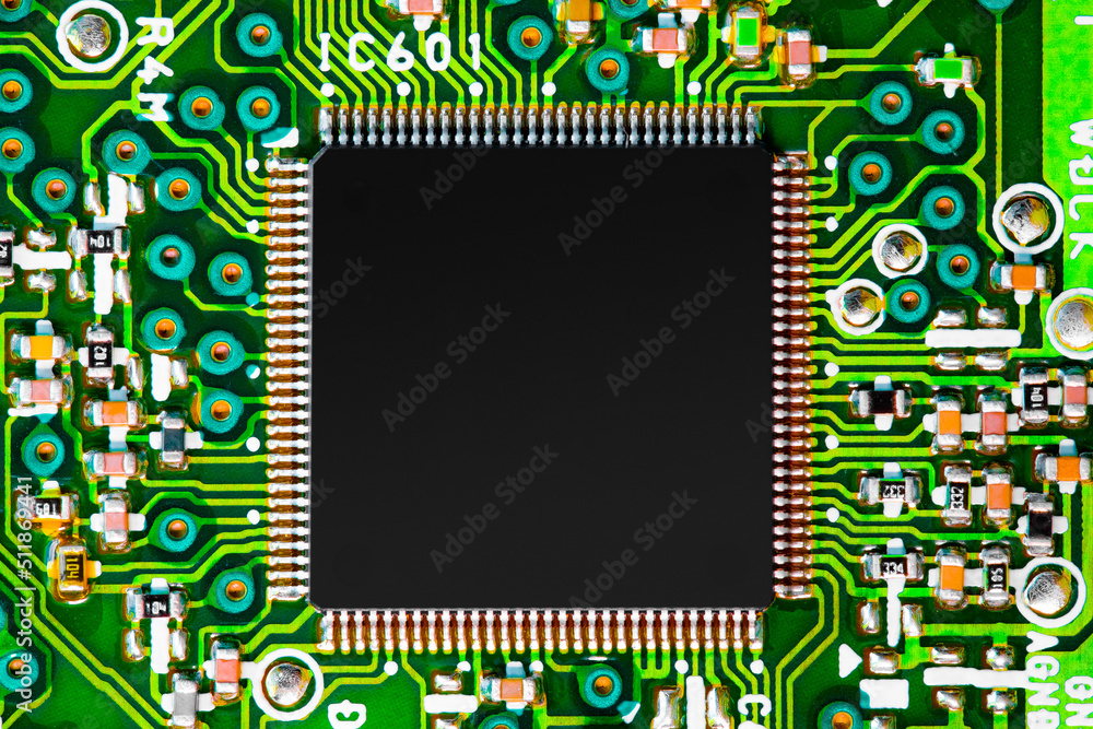 Close up of components and microchips on PC circuit board.