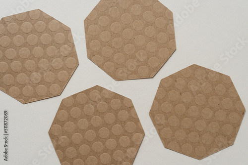 four brown octagonal shapes