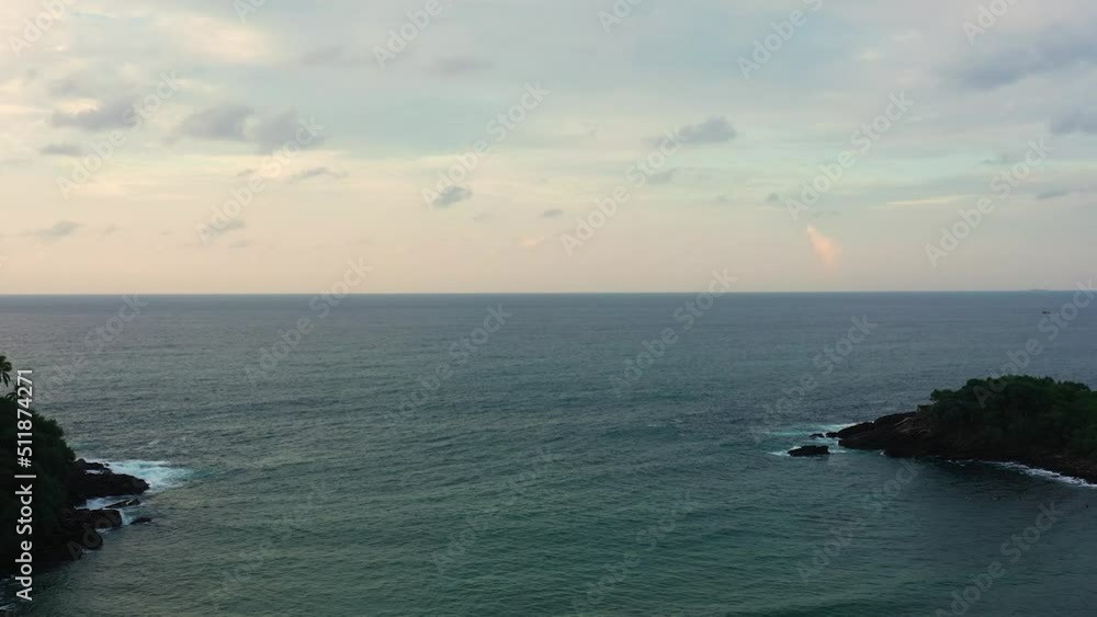 Sunset over the bay and the ocean. Hiriketiya, Sri Lanka. Sunset over the bay and the ocean. Hiriketiya, Sri Lanka.
