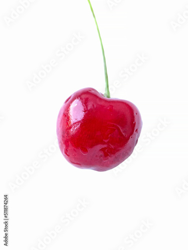 close up of wet red cherry isolated on white