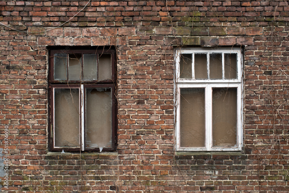 Old brick wall with two windows in abandoned house Old brick wall with two windows in abandoned house