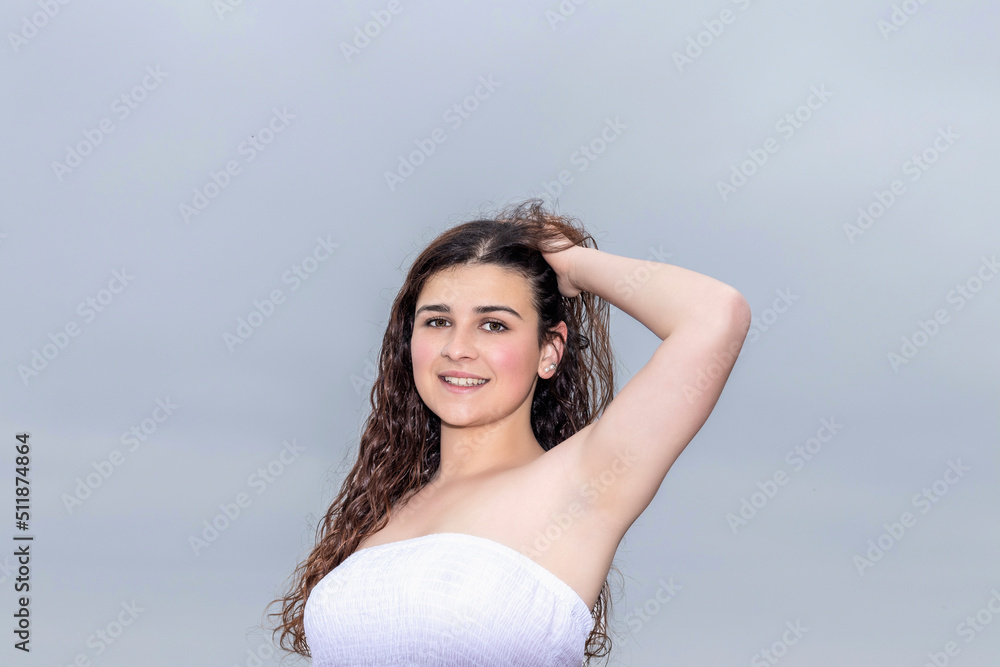 portrait of young brunette woman in white dress portrait of young brunette woman in white dress