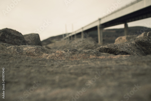 Stones with Bridge in Background