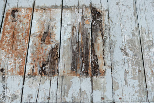 old wooden surface with peeling paint