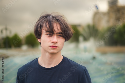 Adrian, Beautiful handsom young man wearing black sweater, Closeup portrait of young man, city, Attractive teenager. caucasian, lifestye, Bucharest photo