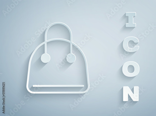Paper cut Handbag icon isolated on grey background. Female handbag sign. Glamour casual baggage symbol. Paper art style. Vector