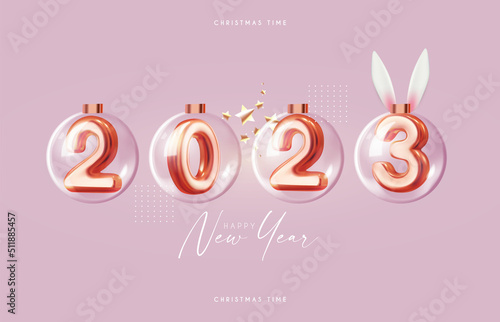 Happy New 2023 Year! Golden text with glass balls and rabbit ears.