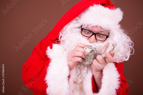 Finance. Funny Santa Claus and money. 