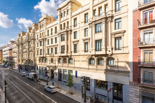 Fototapeta Naklejka Na Ścianę i Meble -  Facades of urban residential buildings in Madrid's Atocha street