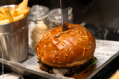 Traditional pub meal - dry aged beef burger with french fries