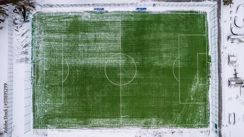 aerial photography top view of the winter football field photo