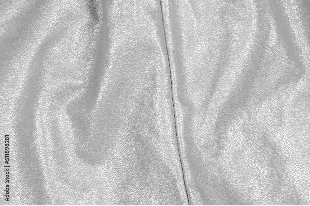 Texture of white leather material with folds. background for designers