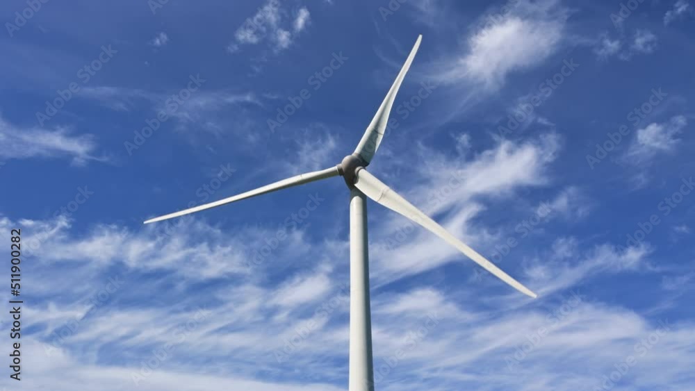 Wind power turbines generating clean renewable energy. Green energy concept Wind power turbines generating clean renewable energy. Green energy concept