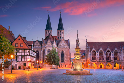 Brunswick, Germany. Cityscape image of historical downtown of Brunswick, Germany with St. Martini Church and Old Town Hall at summer sunset. photo