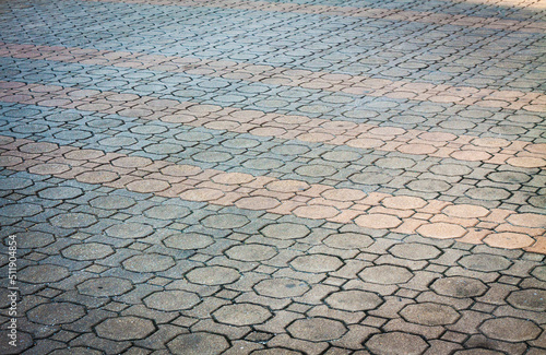 	ID: 492713557
stone pavement in perspective. patterned paving tiles, cement brick floor background. Closeup on cement street floor. block brick background. Stairway. Stone blocks of a Brick Walkway, 