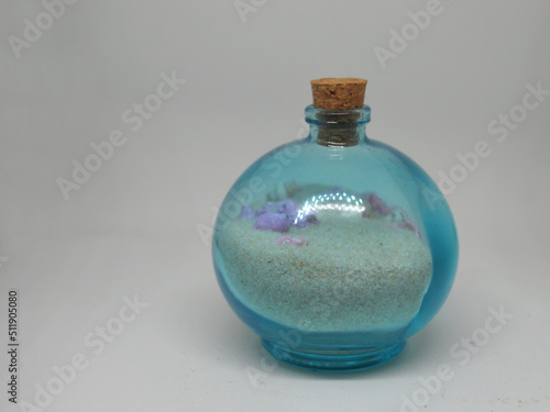 caribbean sea sand in a glass jar