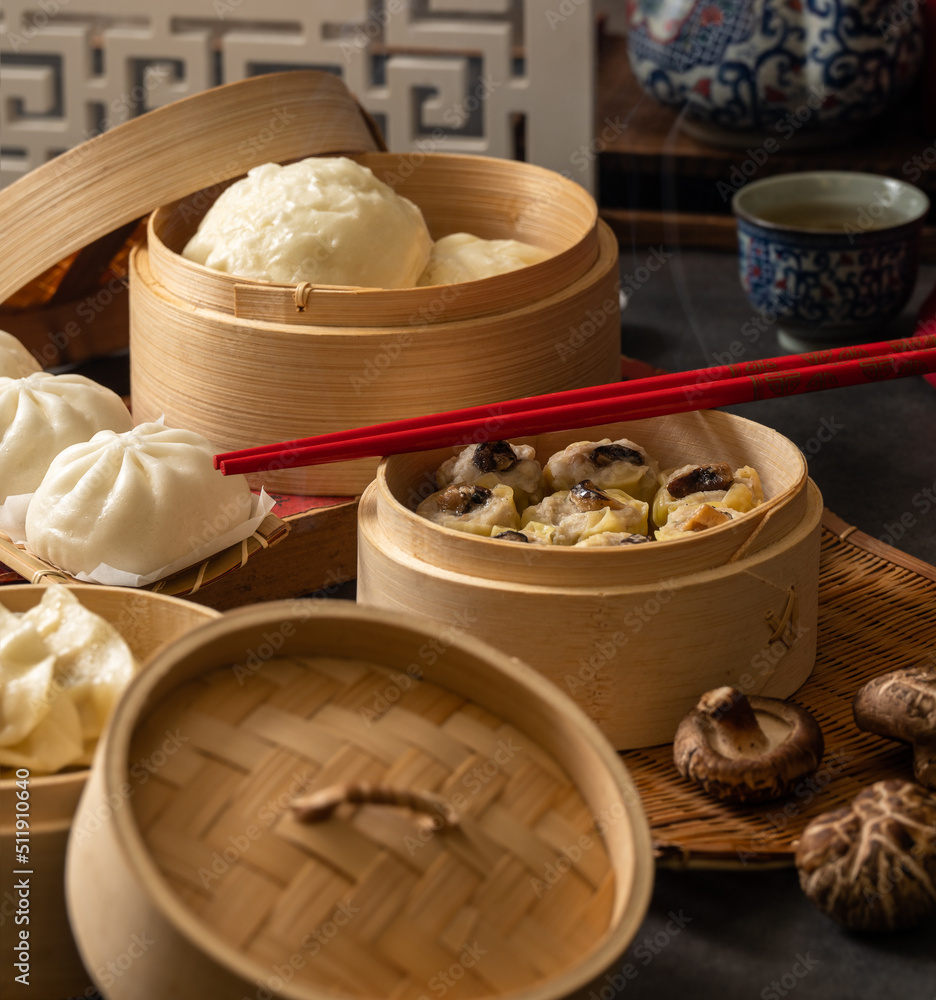 Bamboo steamers with assorted dim sum, Chinese cuisine Stock Photo Adobe Stock
