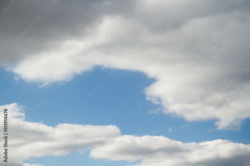 Obraz premium Cumulus clouds. White clouds on a blue background.