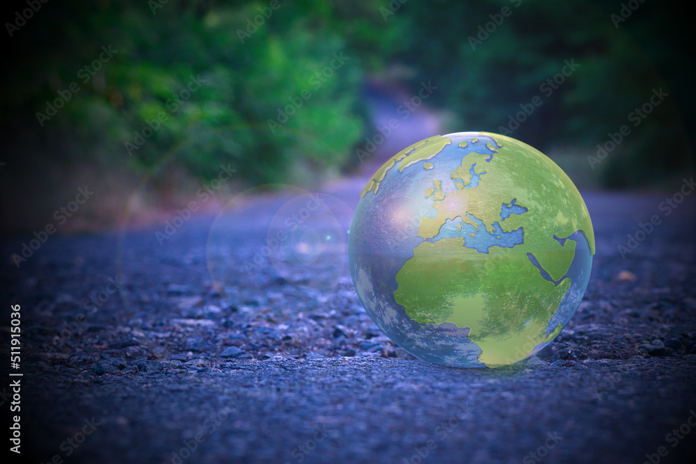 Erdball - Strasse - Ecology - Lensball -High quality photo - Bioeconomy - A closeup of lensball with reflection planet on ground Erdball - Strasse - Ecology - Lensball -High quality photo - Bioeconomy - A closeup of lensball with reflection planet on ground