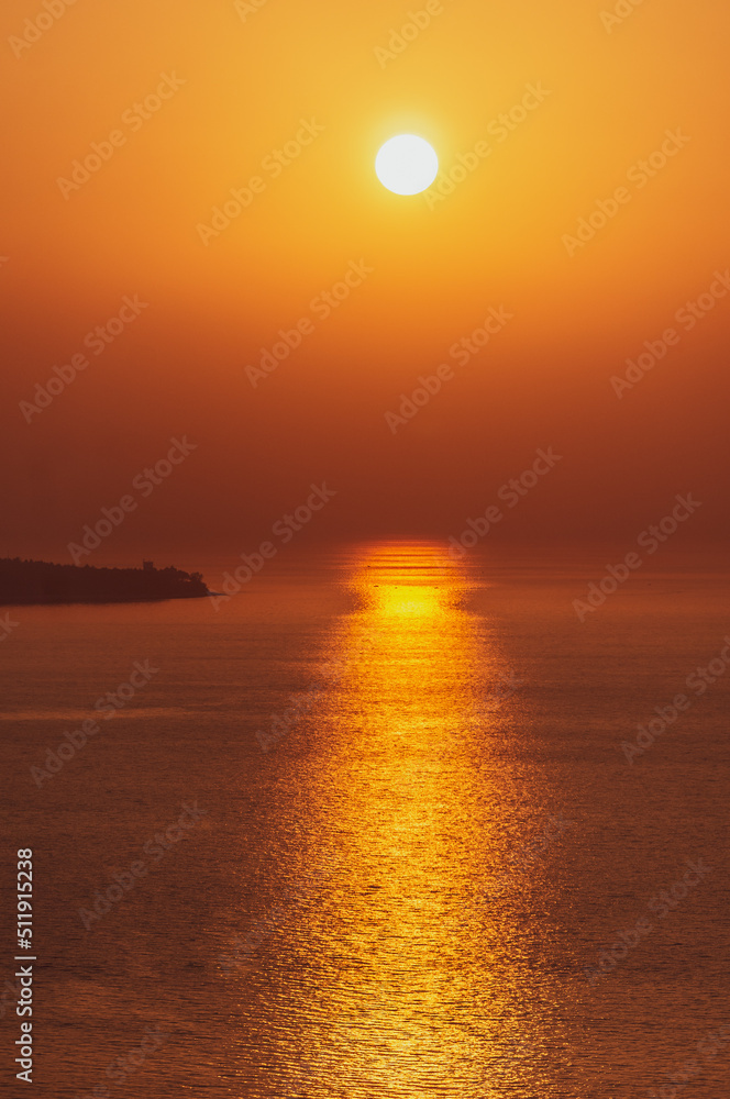 Bright orange sunset in the sea