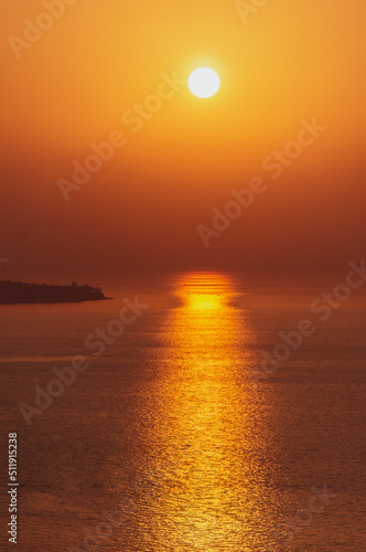 Bright orange sunset in the sea © Maxim