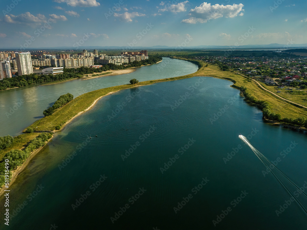small aerial panorama of the lake near the western outskirts of the city of Krasnodar (South of Russia) on a sunny summer day