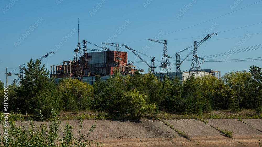 Abandoned fifth and sixth unfinished power unit Chernobyl nuclear power plant on a summer sunny day. Exclusion Zone. Radiation. Radioactivity