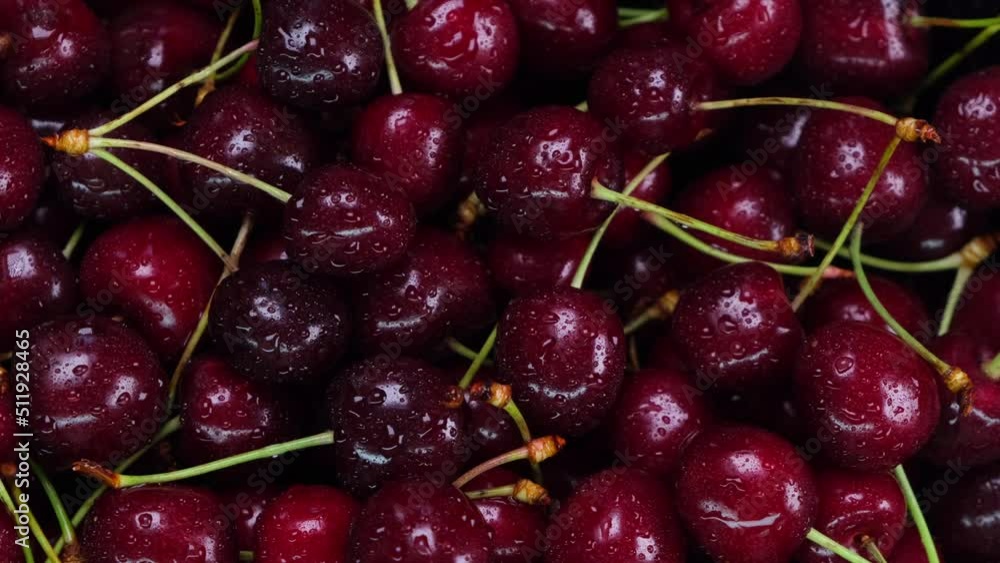 background of ripe cherries with water drops close-up top view background of ripe cherries with water drops close-up top view
