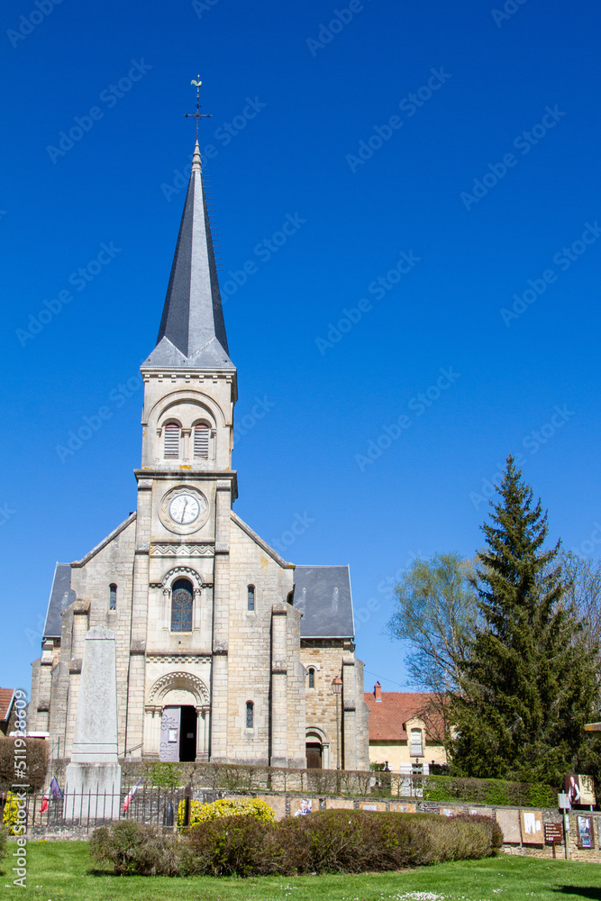 Commarin, France, April 17, 2022. Facade of the Saint-Thibault church in Commarin