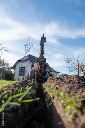Photography trencher while working plot day