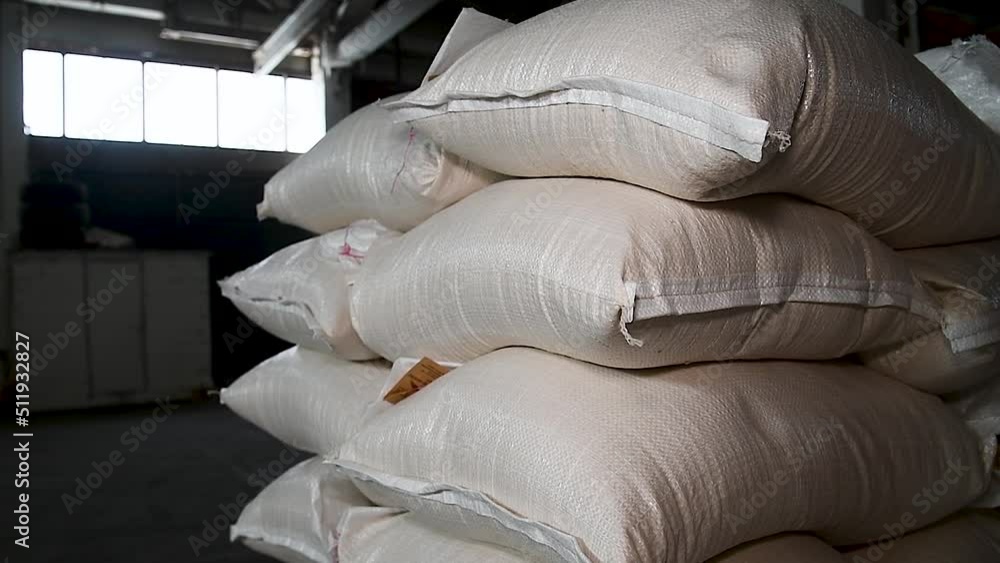 Food warehouse. Bags of rice, sugar, flour and other products. Food warehouse. Bags of rice, sugar, flour and other products.