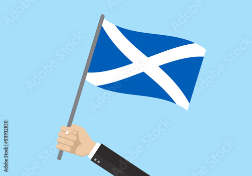 Scotland waving flag. Hand holding Scottish flag. National symbol. Vector illustration. 