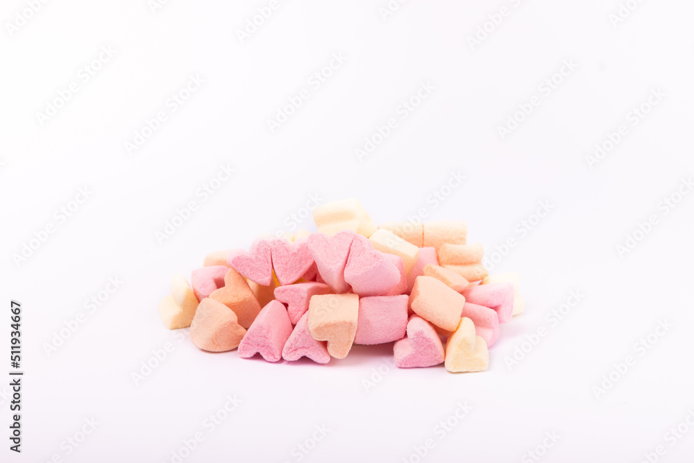 Delicious pink marshmallow isolated on white background. Sweets with strawberry flavor. Delicious pink marshmallow isolated on white background. Sweets with strawberry flavor.