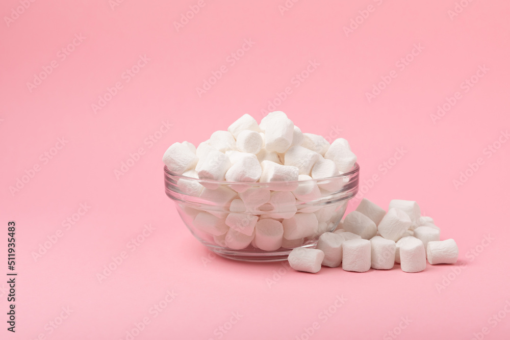 Marshmallow in a glass jar isolated on white background. Fruit flavored sweets. strawberry marshmallow Marshmallow in a glass jar isolated on white background. Fruit flavored sweets. strawberry marshmallow