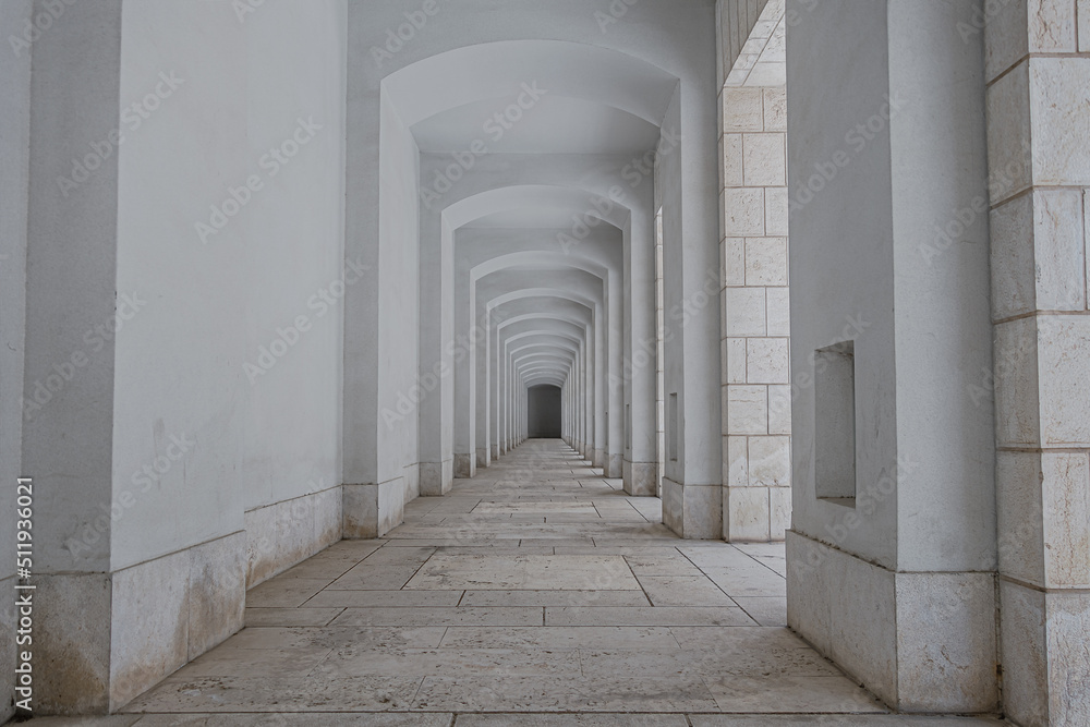 Obraz premium perspective view of corridor in an old stone building