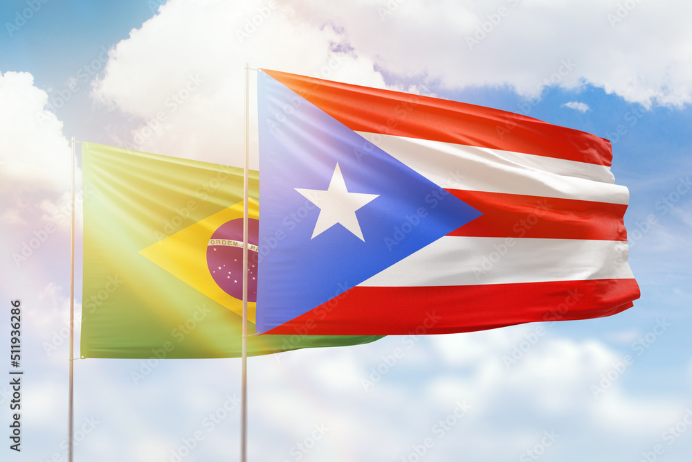 Sunny blue sky and flags of puerto rico and brazil Sunny blue sky and flags of puerto rico and brazil