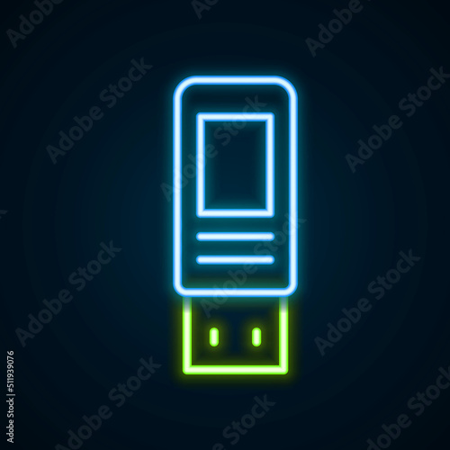 Glowing neon line USB flash drive icon isolated on black background. Colorful outline concept. Vector