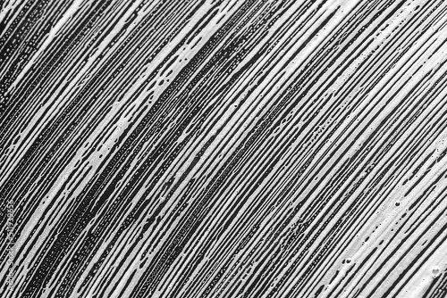 abstract background white soap foam on black surface
