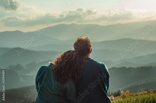 Canvas Print couple a man and a woman sit together bowing their heads on their shoulders and