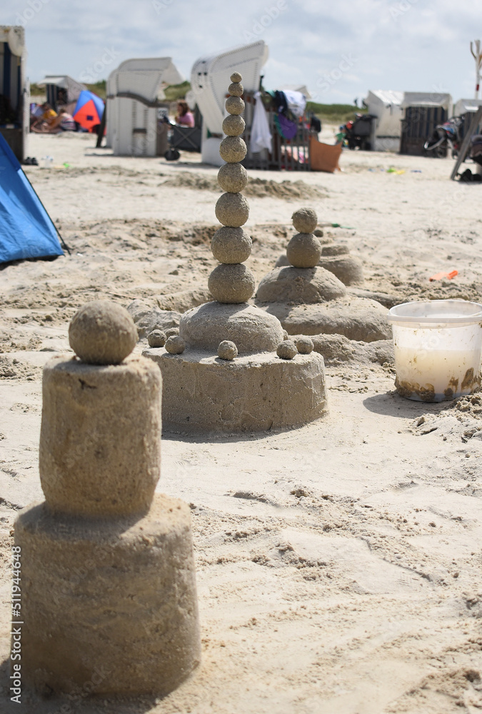 Amazing sand sculpture and sand art at the beach in the sunny summer