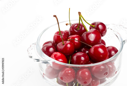 Bunch of cherries on transparent plate white background