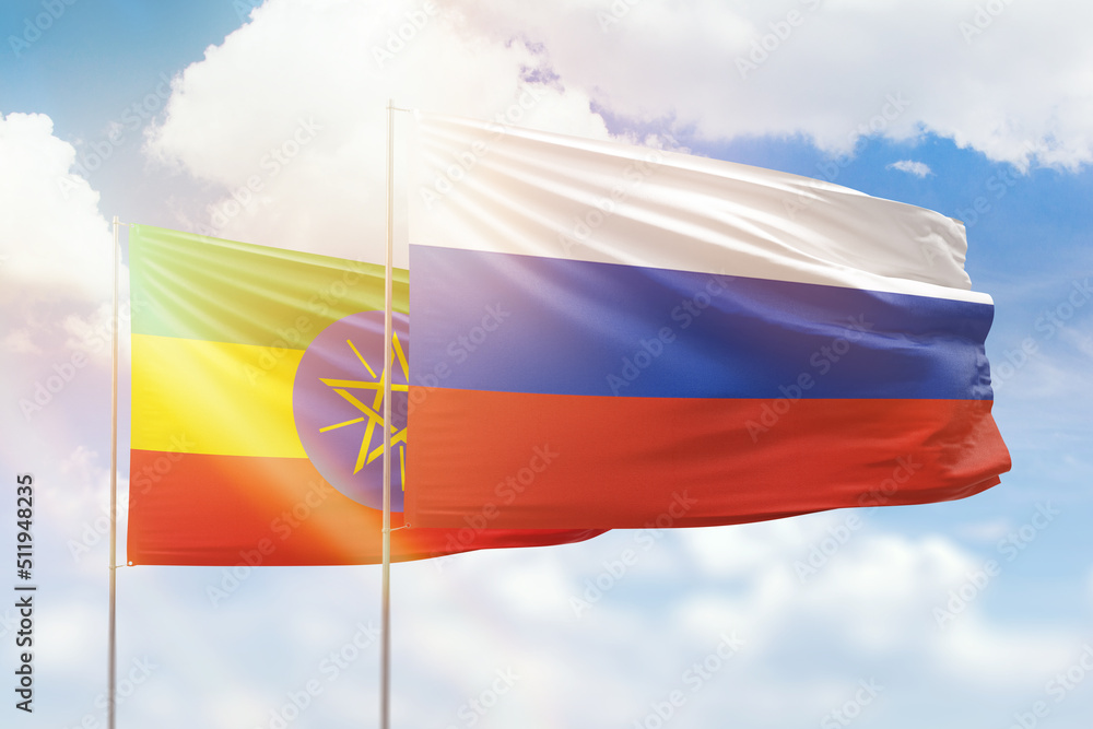 Sunny blue sky and flags of russia and ethiopia Sunny blue sky and flags of russia and ethiopia