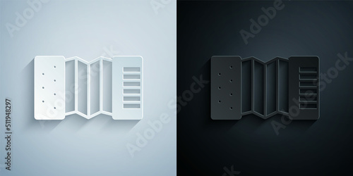 Paper cut Musical instrument accordion icon isolated on grey and black background. Classical bayan, harmonic. Paper art style. Vector