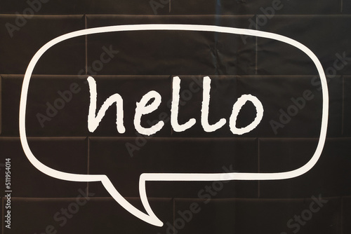 Hello message with speech bubble on black background