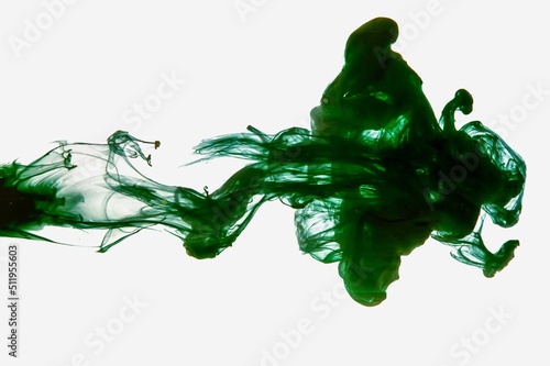 Deep green ink in water with smokey design. Alcohol ink fluid abstract texture fluid art and liquid